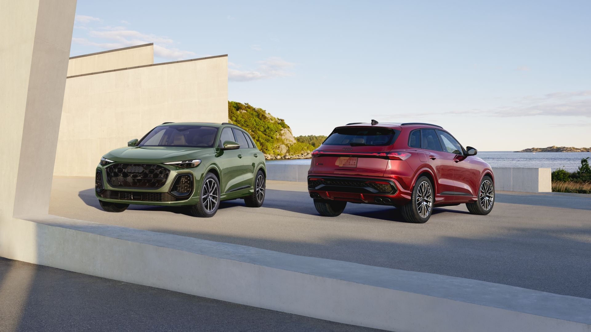 Front and rear profile views of Audi Q5s parked side by side.